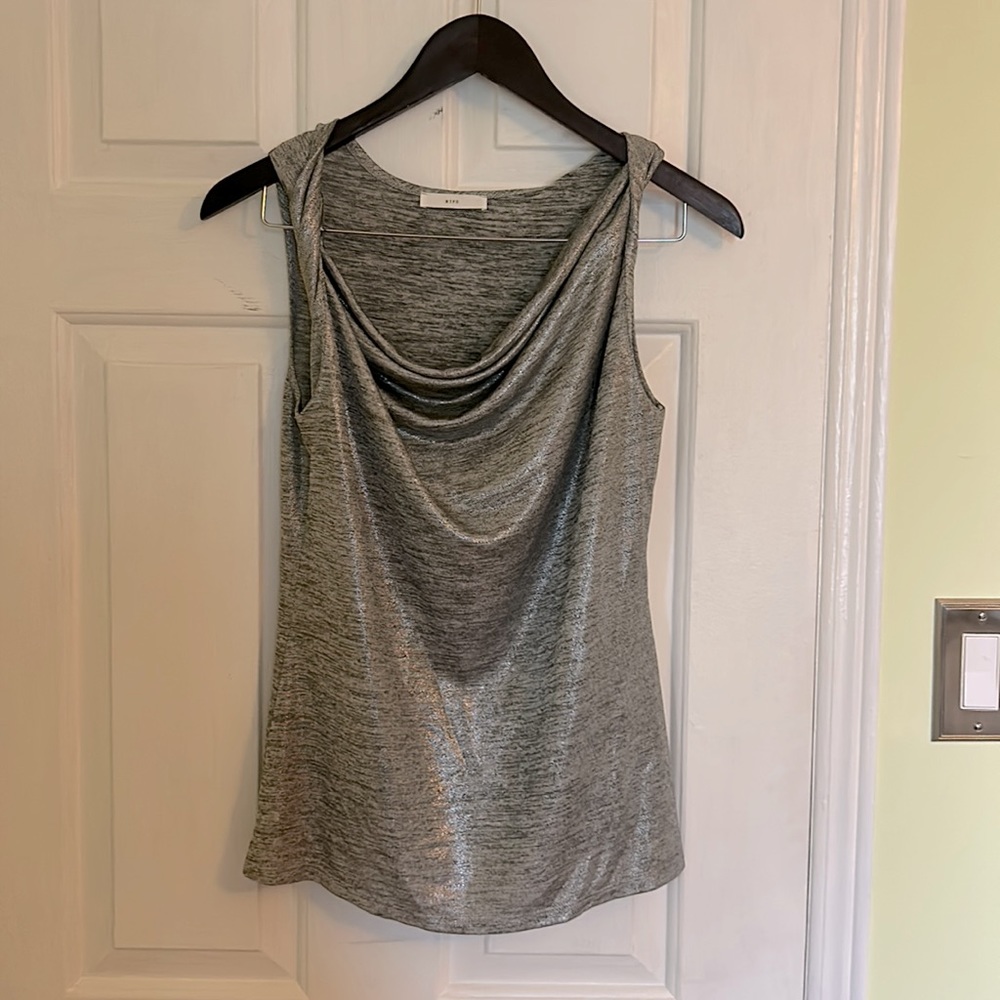 Shiny silver tank with twisted shoulders